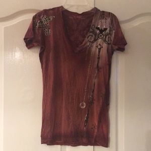 Remetee by a founder of Affliction tee